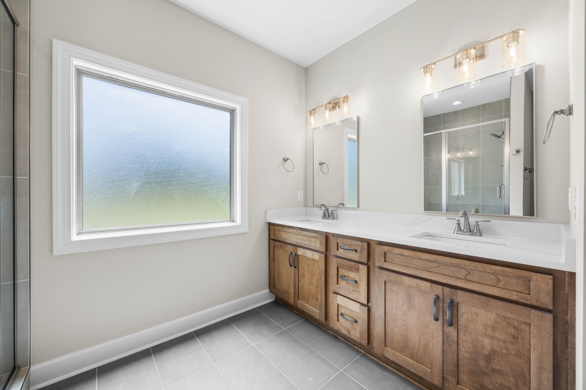 1456 Sango Commons Way Clarksville, TN 37043 - Photo 29 of 49 a spacious bathroom with a granite countertop sink mirror and