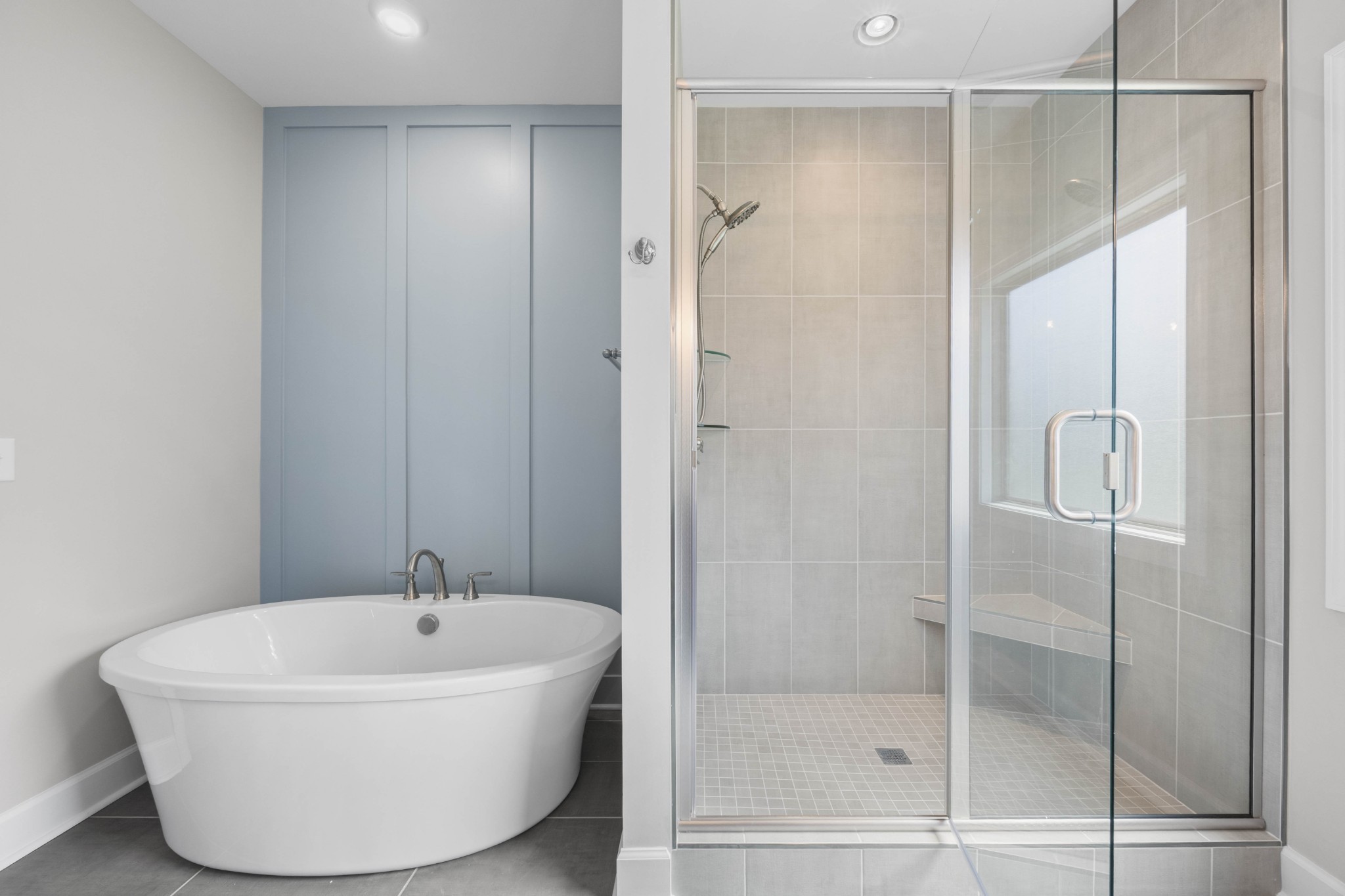 1456 Sango Commons Way Clarksville, TN 37043 - Photo 30 of 49 a white bath tub sitting next to a shower