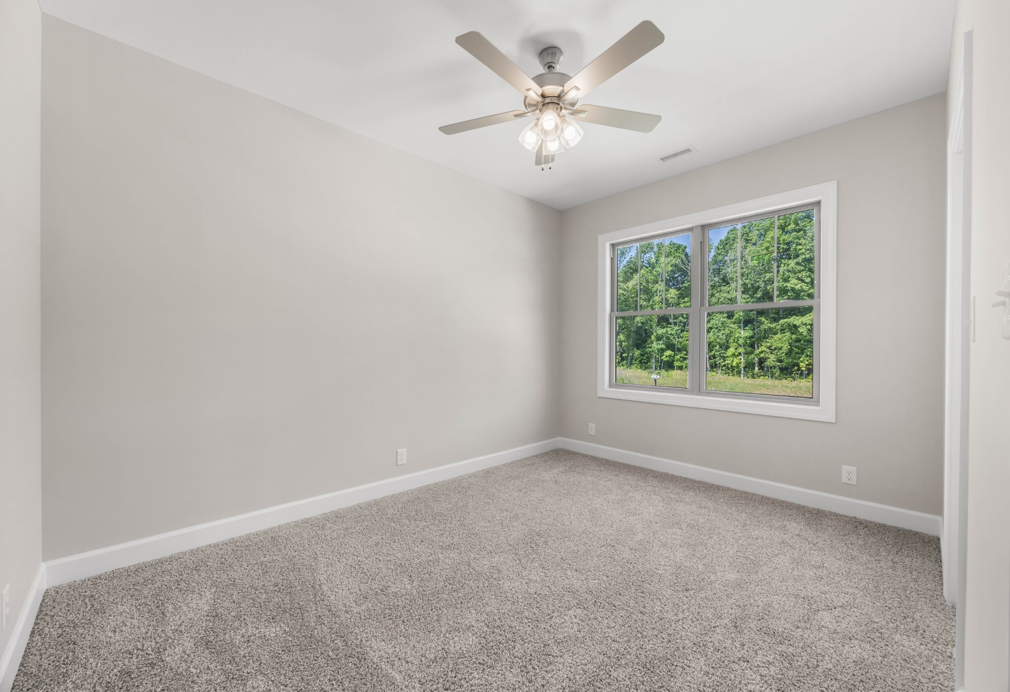 1456 Sango Commons Way Clarksville, TN 37043 - Photo 31 of 49 an empty room with a window