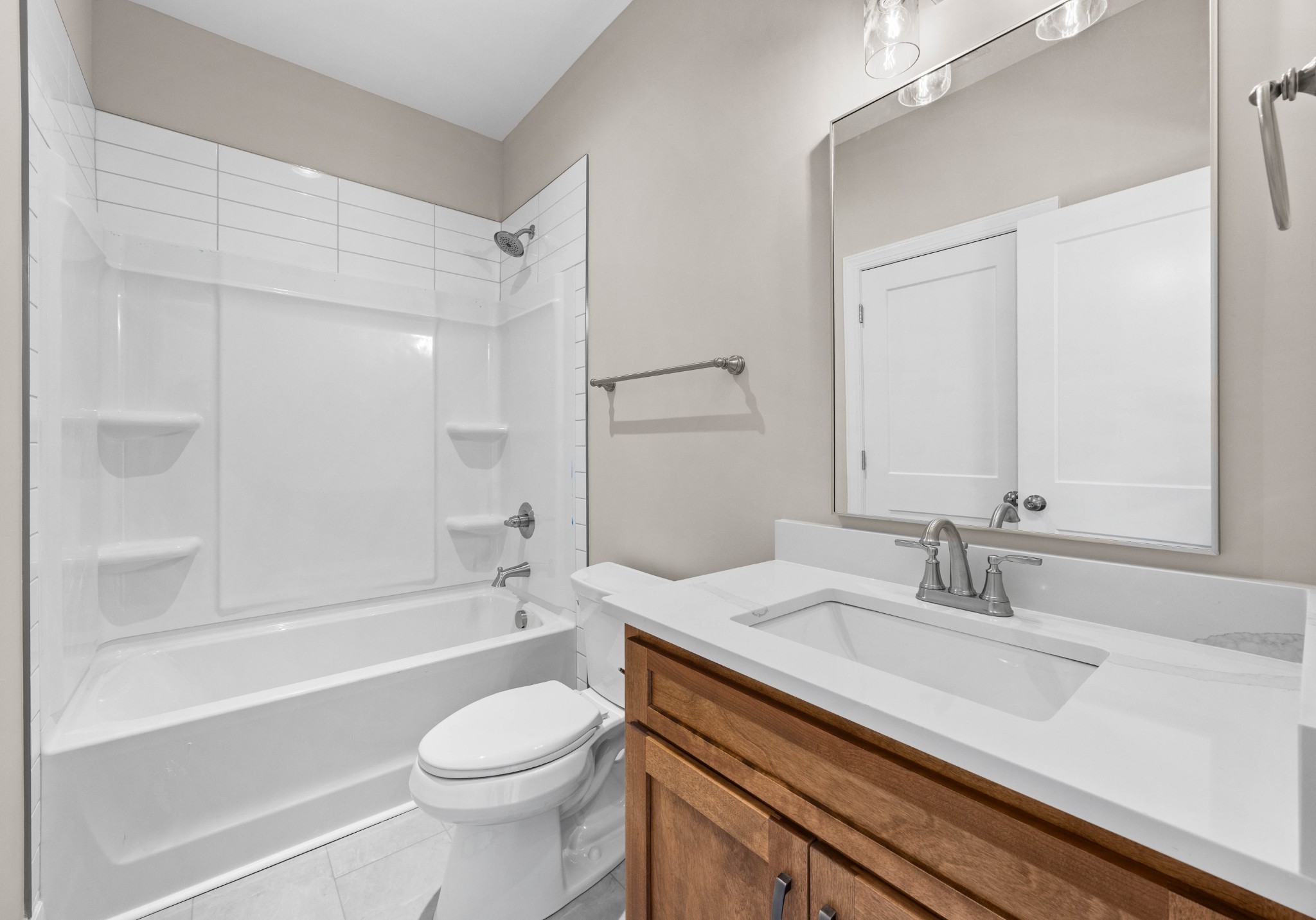 1456 Sango Commons Way Clarksville, TN 37043 - Photo 39 of 49 a bathroom with a sink a toilet and a bathtub