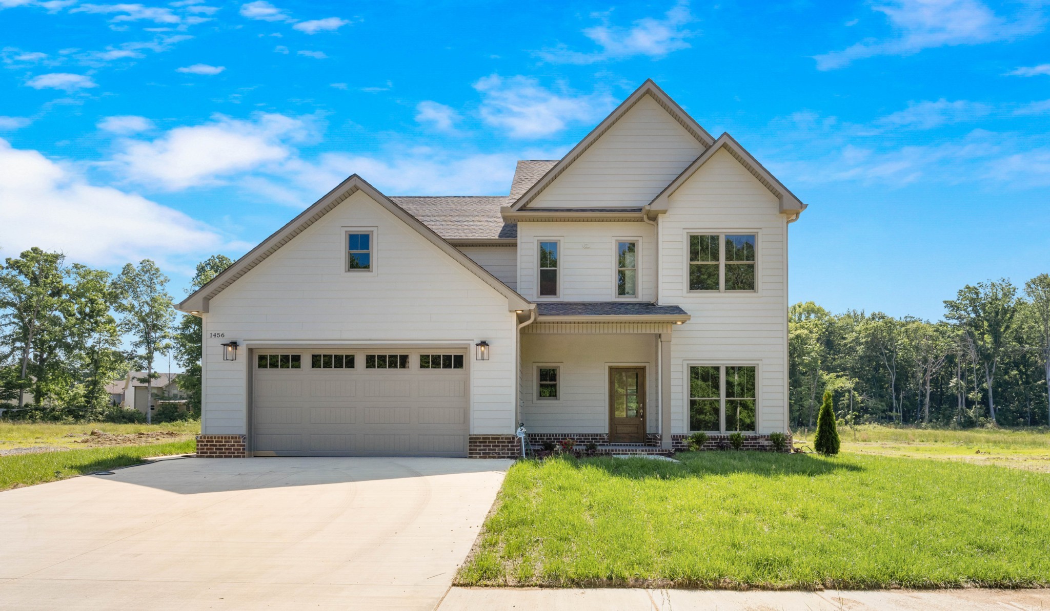 1456 Sango Commons Way Clarksville, TN 37043 - Photo 4 of 49 a view of house with yard and green space