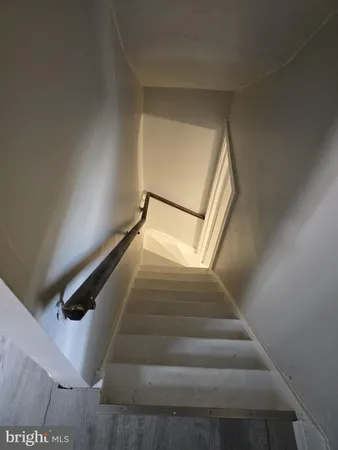 a bathroom with a shower and a toilet