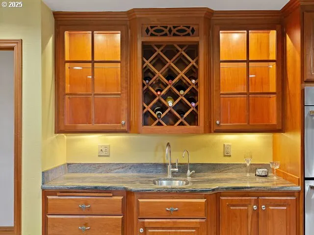 a bedroom with a bed and flat screen tv