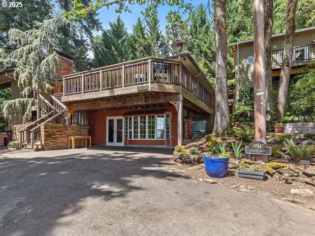 a front view of house with an outdoor space