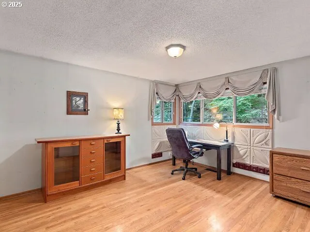 a bathroom with a sink vanity and a mirror
