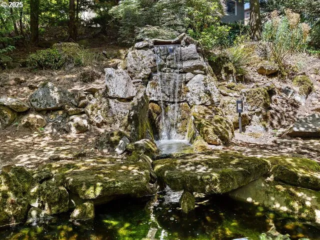 a view of a house with a tree