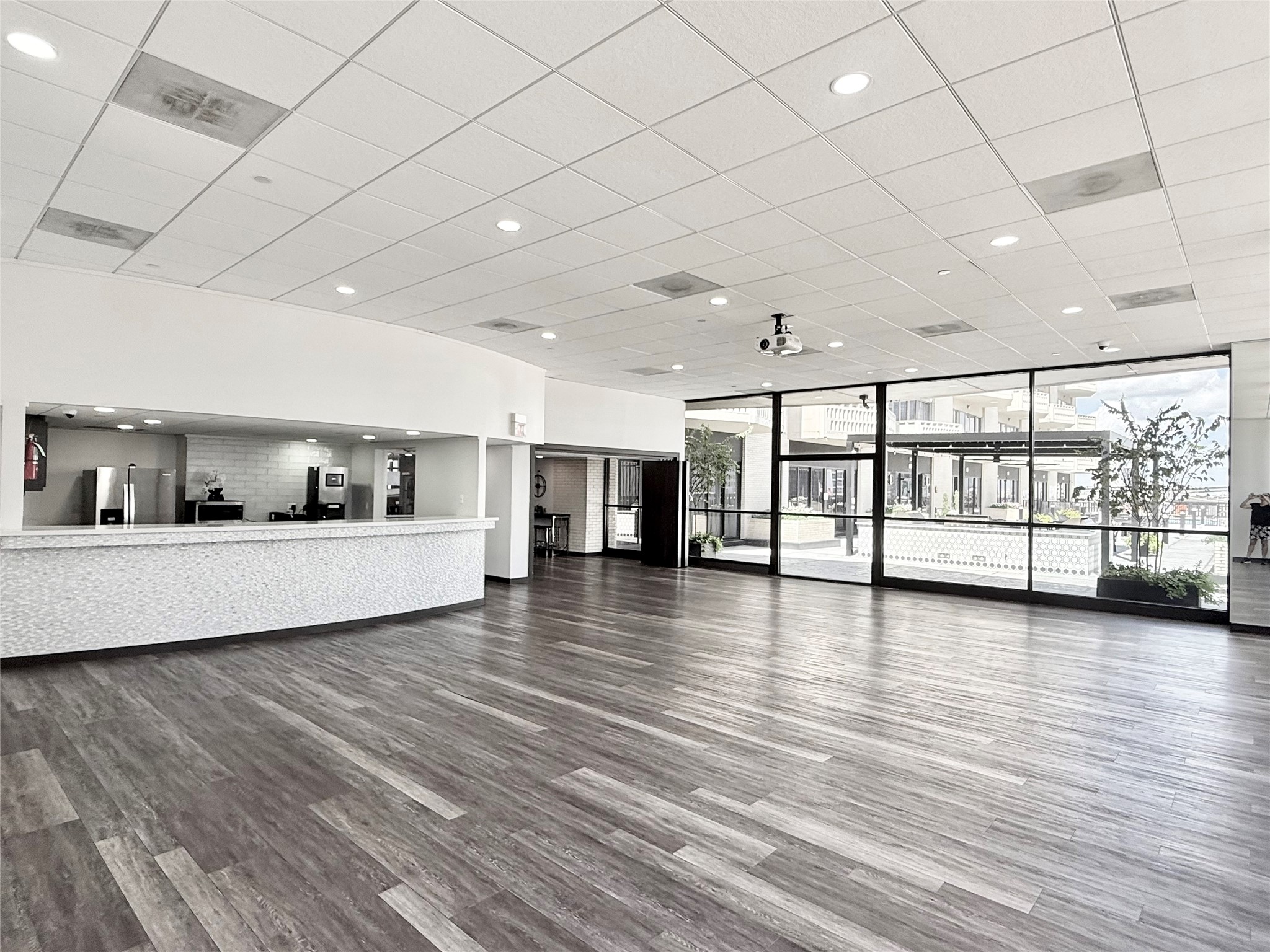 2016 Main Street, Unit 1022 Houston, TX 77002 - Photo 39 of 48 a view of an empty room with window and wooden floor