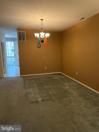 en empty room with windows