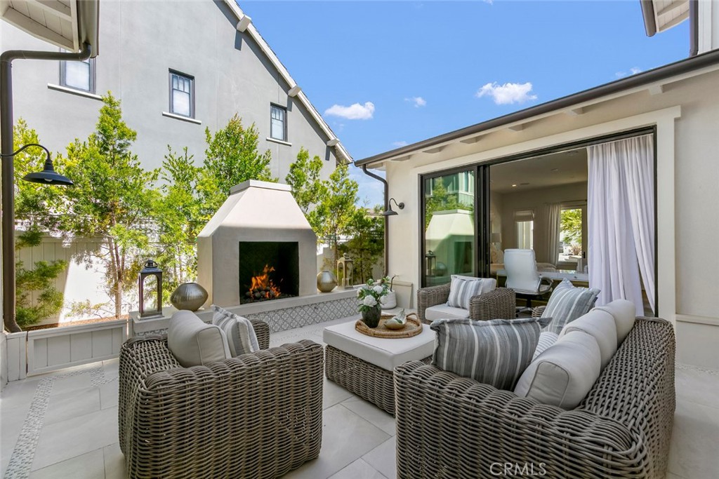 5 Rancho Elastico Road Rolling Hills Estates, CA 90274 - Photo 11 of 48 a living room with furniture fireplace and a large window