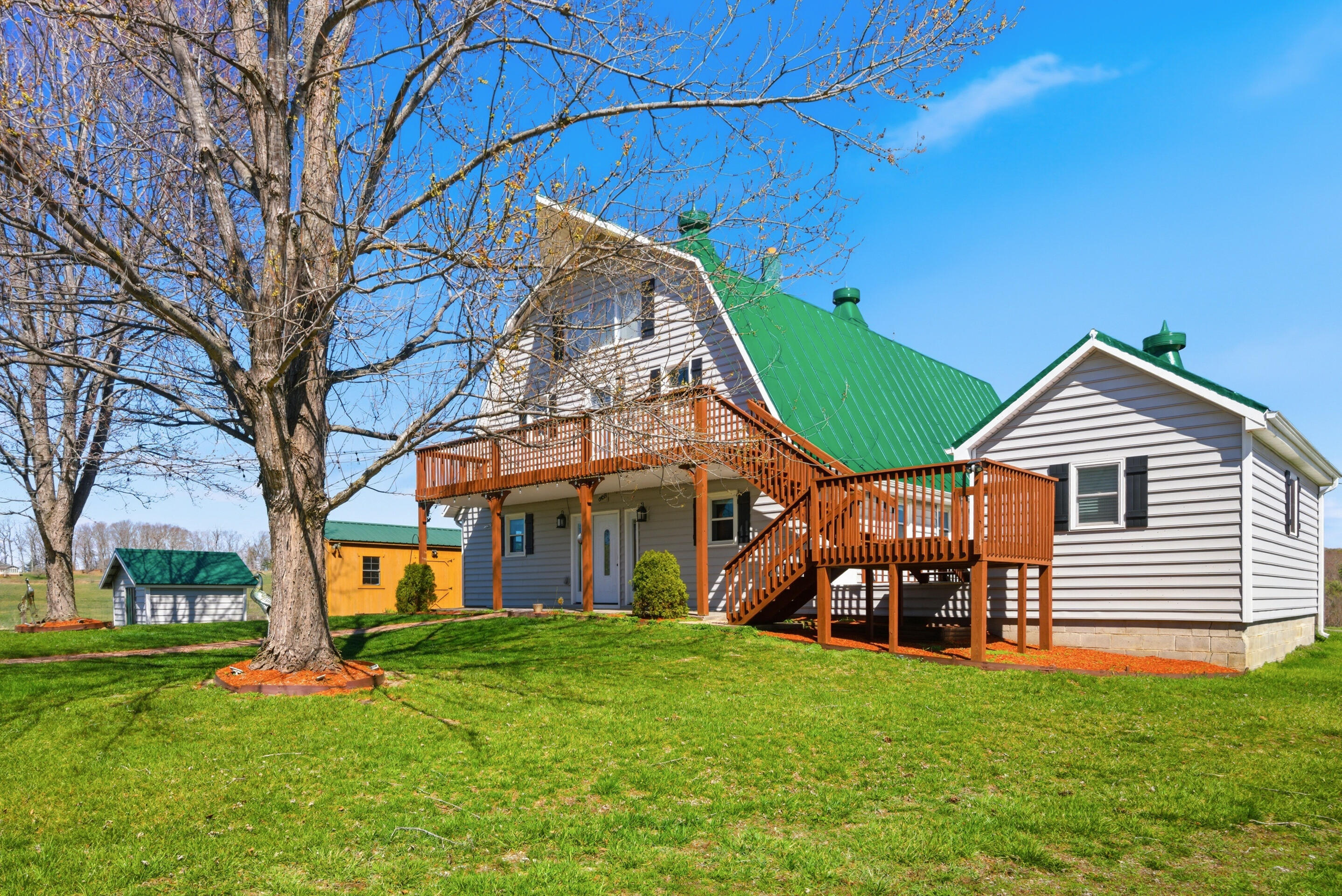 6458 Piney Woods Road Riner, VA 24149 - Photo 36 of 50 a view of a house with a backyard