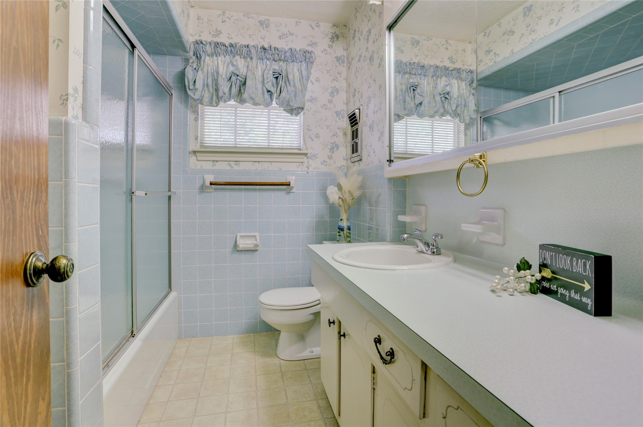 105 Ridgemont Drive Alvin, TX 77511 - Photo 23 of 30 a bathroom with a sink vanity granite and toilet