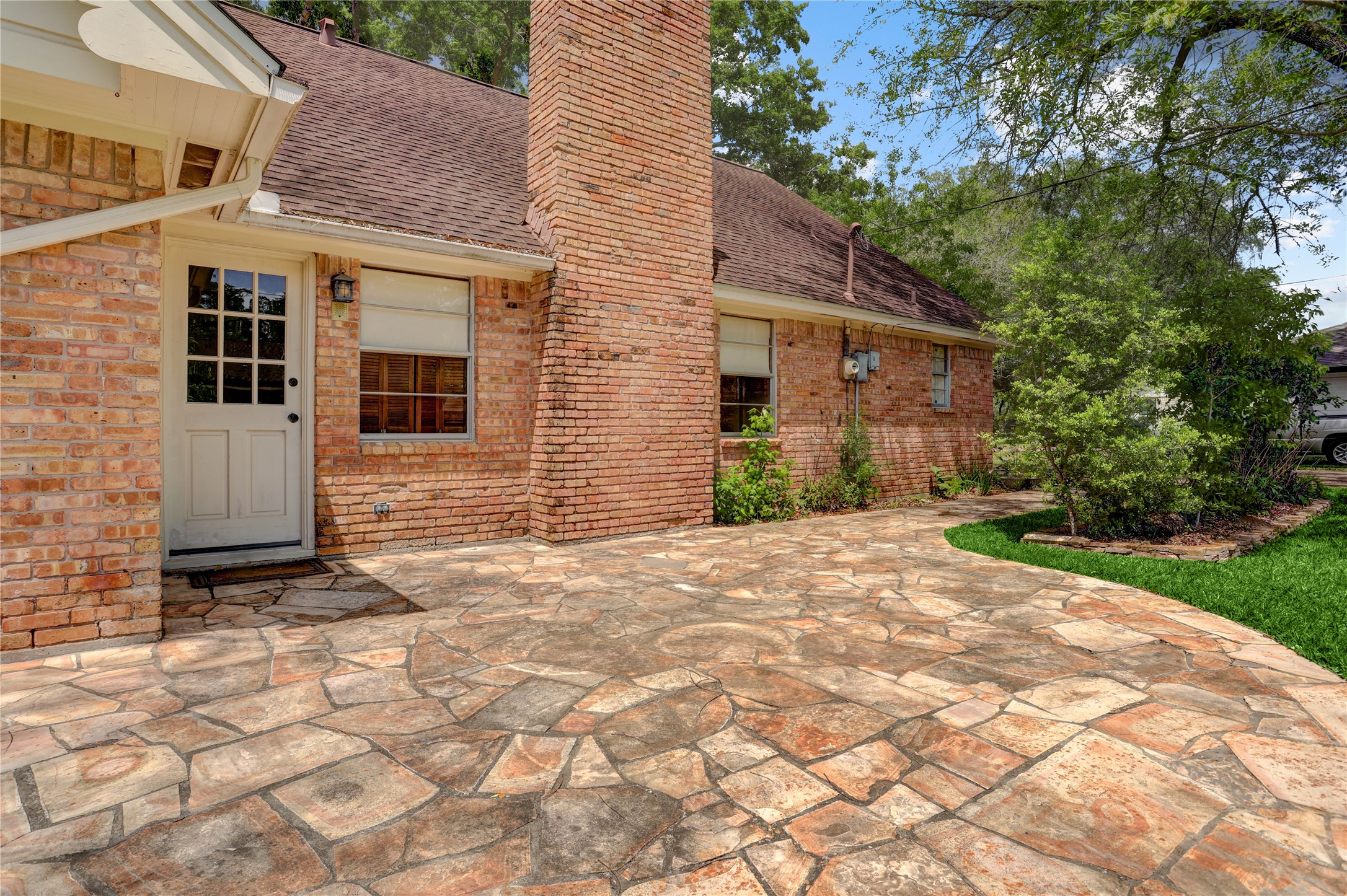 105 Ridgemont Drive Alvin, TX 77511 - Photo 24 of 30 a front view of a house with a yard