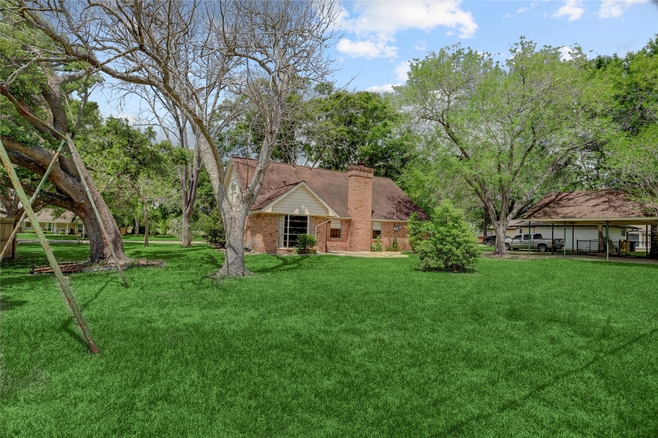 105 Ridgemont Drive Alvin, TX 77511 - Photo 27 of 30 a front view of a house with garden