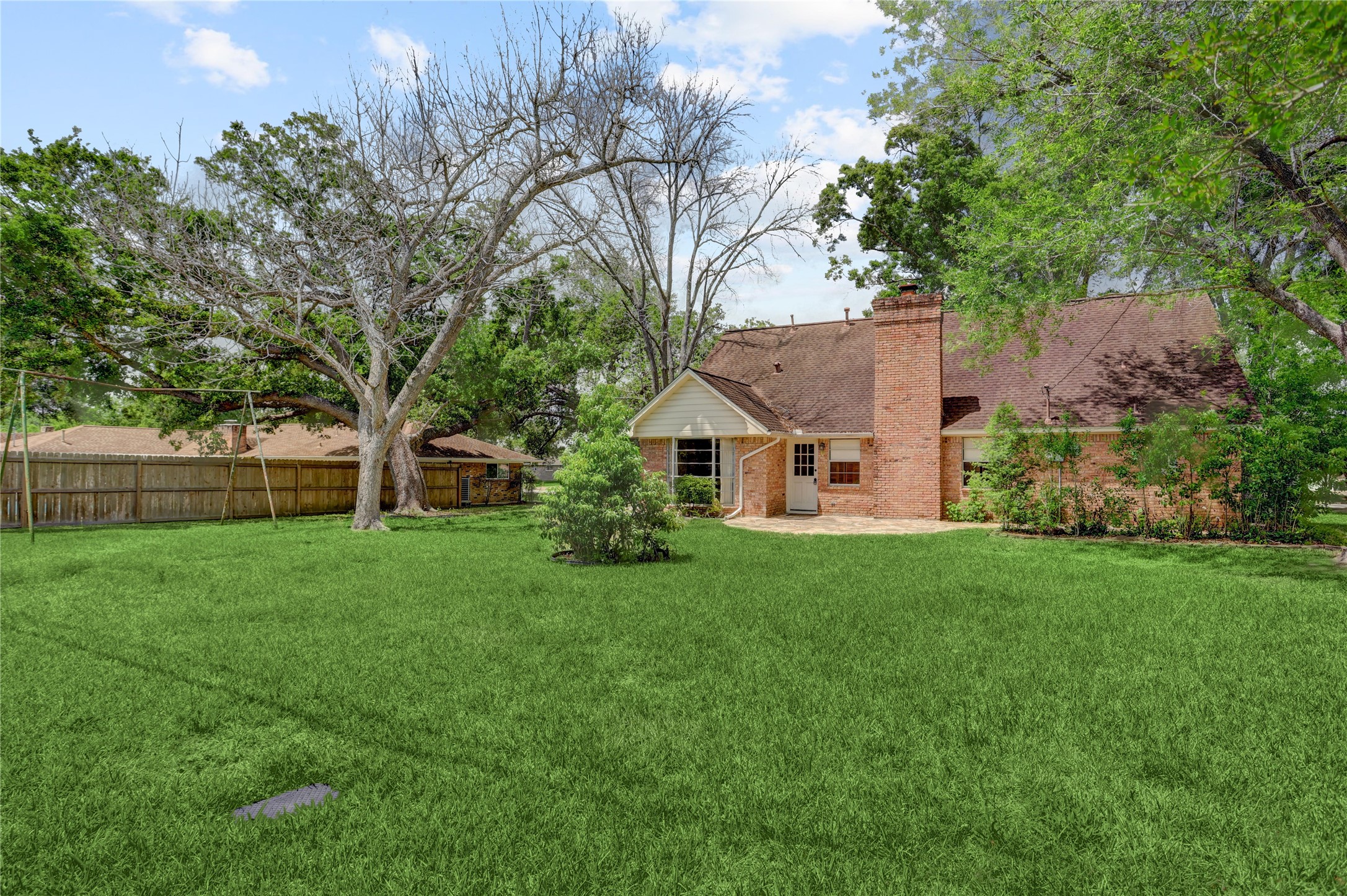 105 Ridgemont Drive Alvin, TX 77511 - Photo 28 of 30 a view of a house with backyard and garden