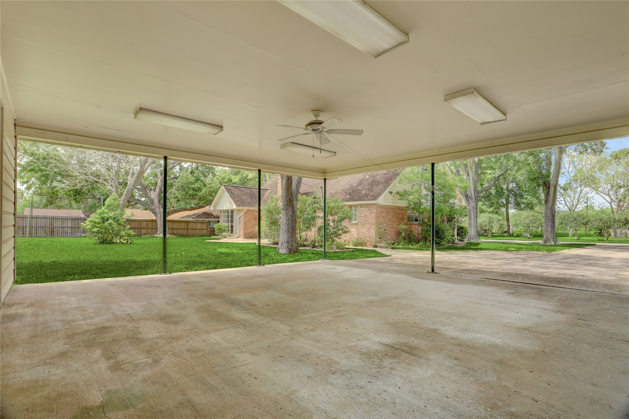 105 Ridgemont Drive Alvin, TX 77511 - Photo 29 of 30 a view of a house with a big yard and an outdoor space