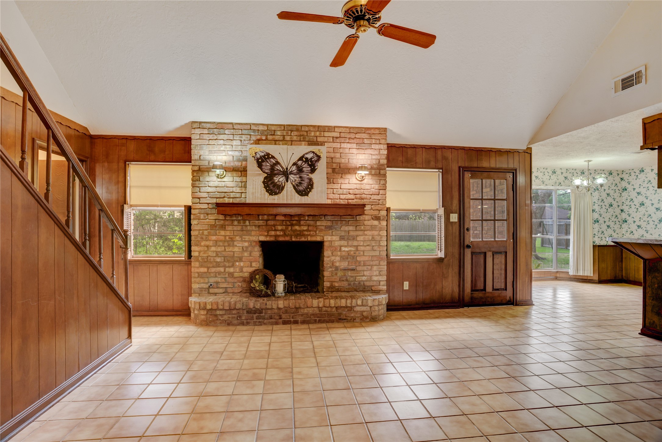 105 Ridgemont Drive Alvin, TX 77511 - Photo 6 of 30 a view of a livingroom with furniture and staircase