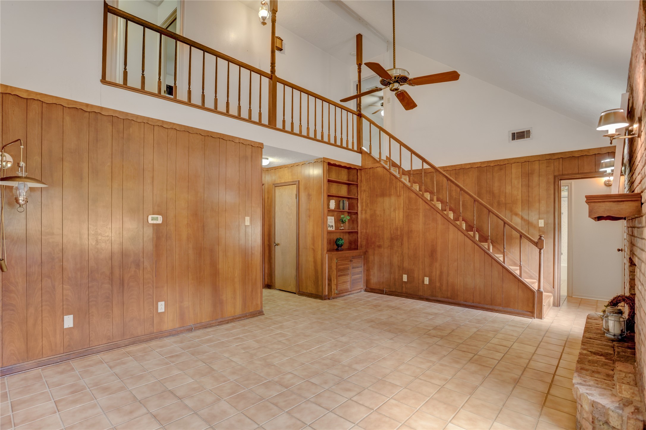 105 Ridgemont Drive Alvin, TX 77511 - Photo 7 of 30 a view of a hallway with staircase