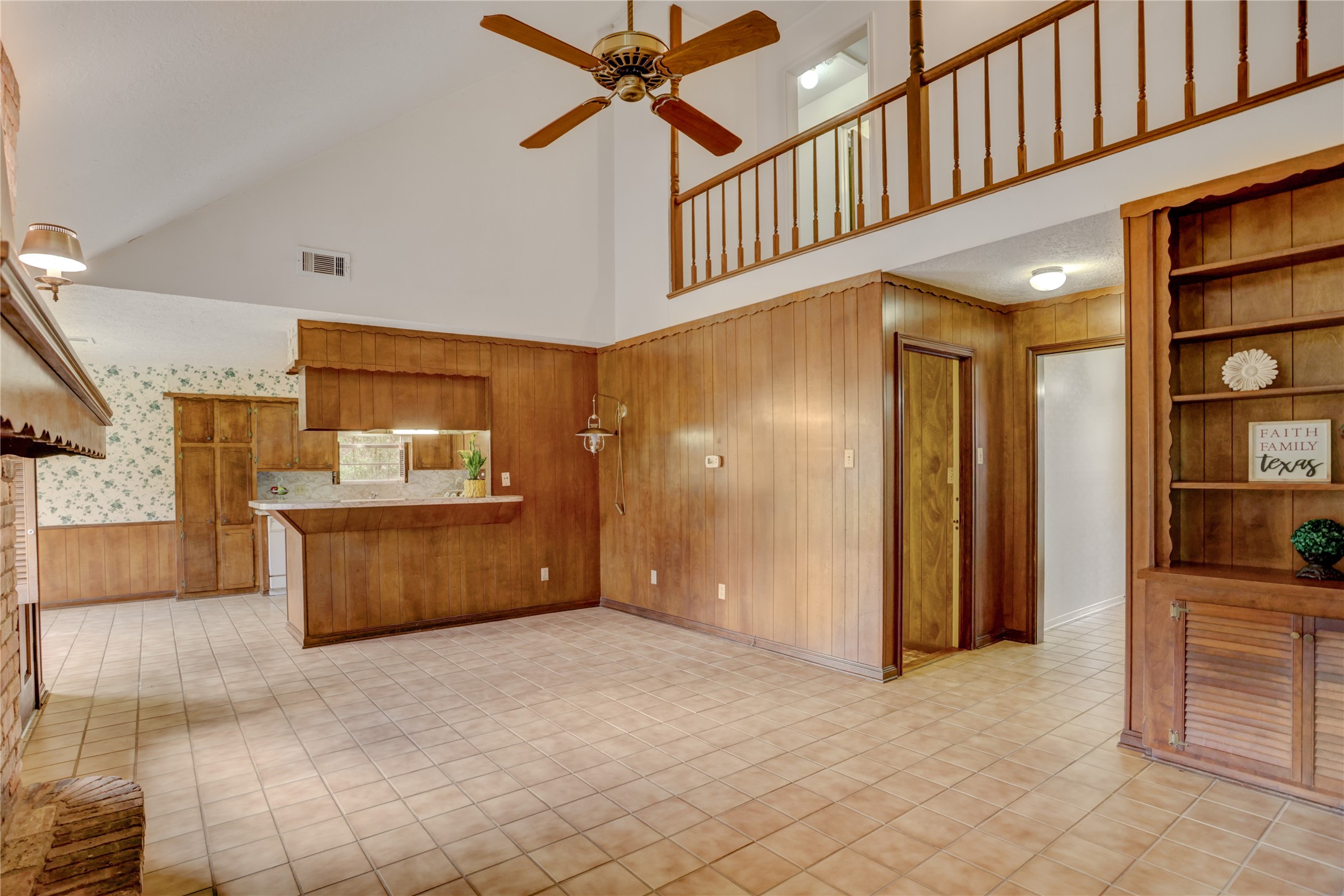 105 Ridgemont Drive Alvin, TX 77511 - Photo 9 of 30 a view of a kitchen with furniture and a kitchen