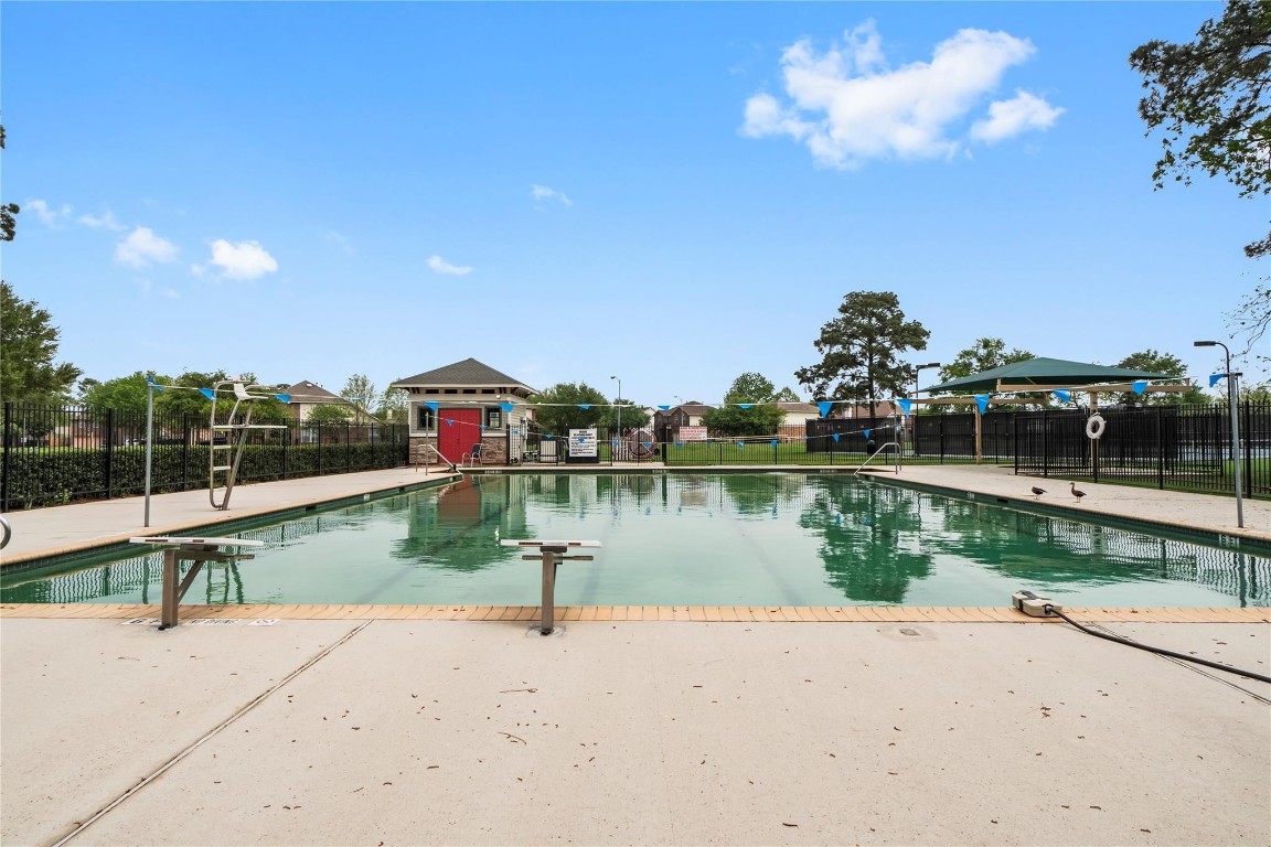 19218 Trinity Terrace Ln Spring Spring, TX 77379 - Photo 43 of 46 Enjoy our community pool, perfect for cooling off on warm Texas days, weekend relaxation, and making summer memories with family and friends.