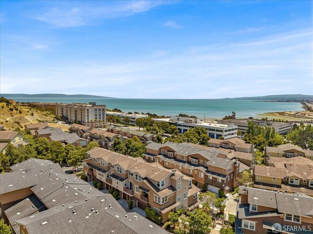 an aerial view of a city with lots of residential buildings