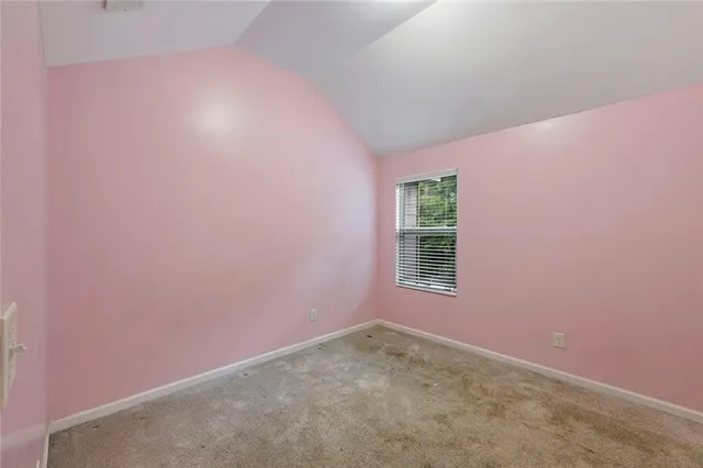 a view of a window in an empty room