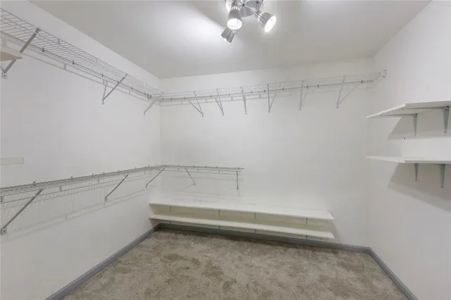 a view of a room with racks on the wall