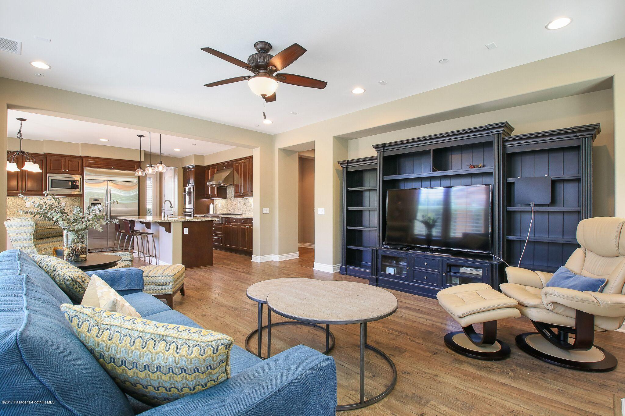 3406 Avondale Road Pasadena, CA 91107 - Photo 12 of 22 a living room with furniture and a flat screen tv
