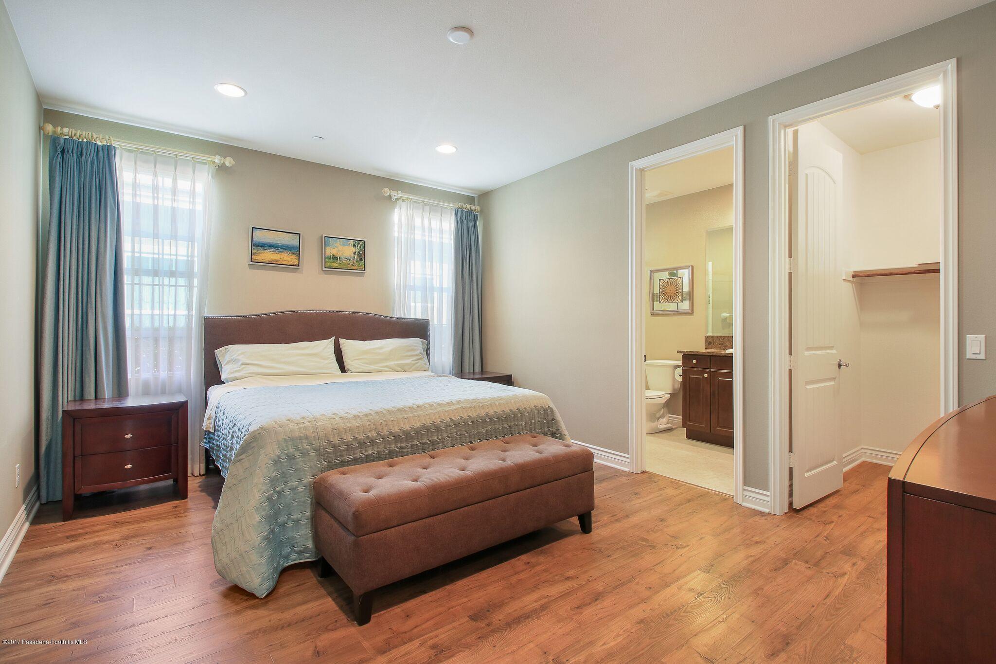 3406 Avondale Road Pasadena, CA 91107 - Photo 15 of 22 a spacious bedroom with a bed and a dresser