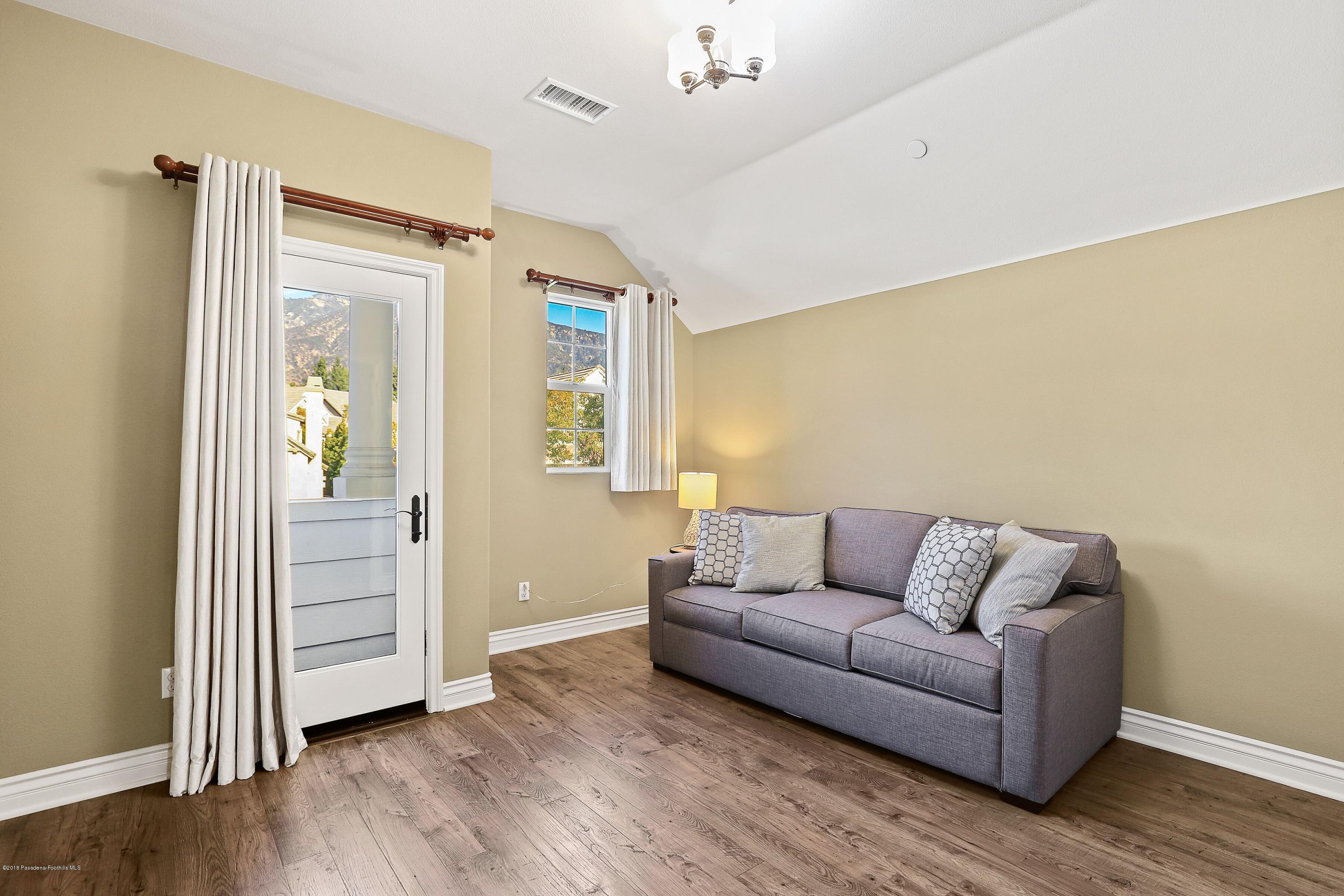 3406 Avondale Road Pasadena, CA 91107 - Photo 18 of 22 a living room with furniture and a window