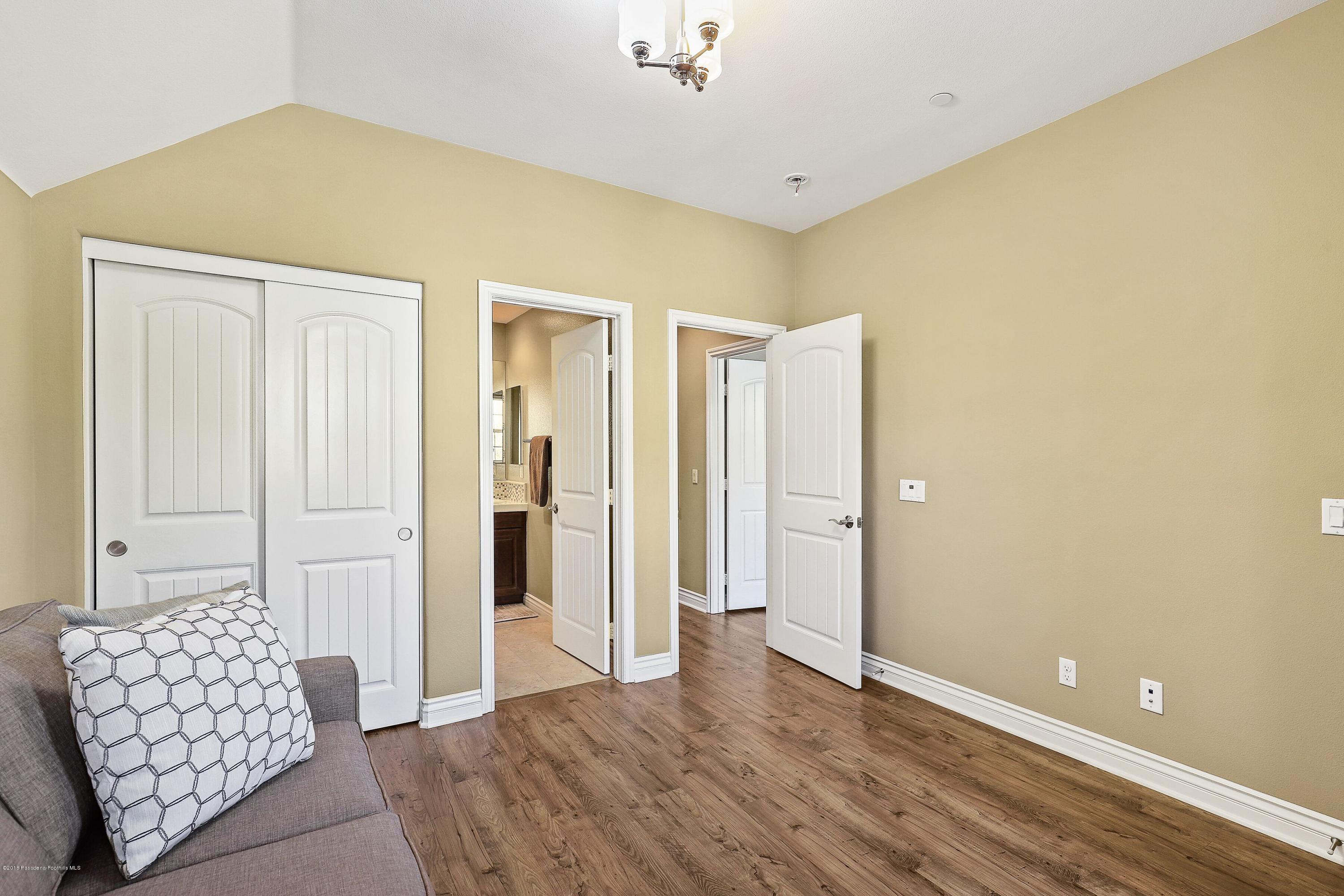 3406 Avondale Road Pasadena, CA 91107 - Photo 19 of 22 a bedroom with a bed and a couch
