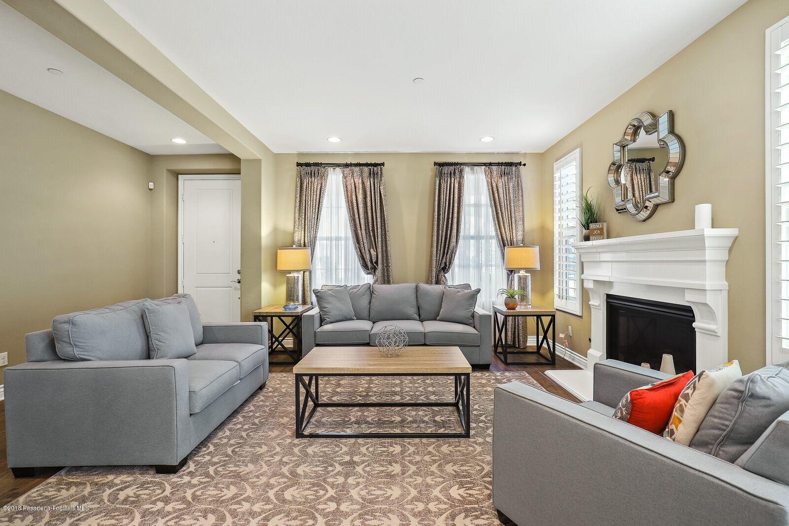 3406 Avondale Road Pasadena, CA 91107 - Photo 3 of 22 a living room with furniture and a fireplace