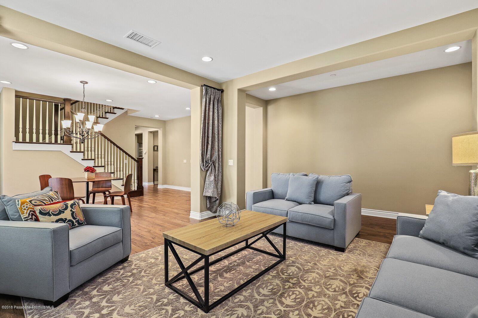 3406 Avondale Road Pasadena, CA 91107 - Photo 4 of 22 a living room with furniture and a potted plant