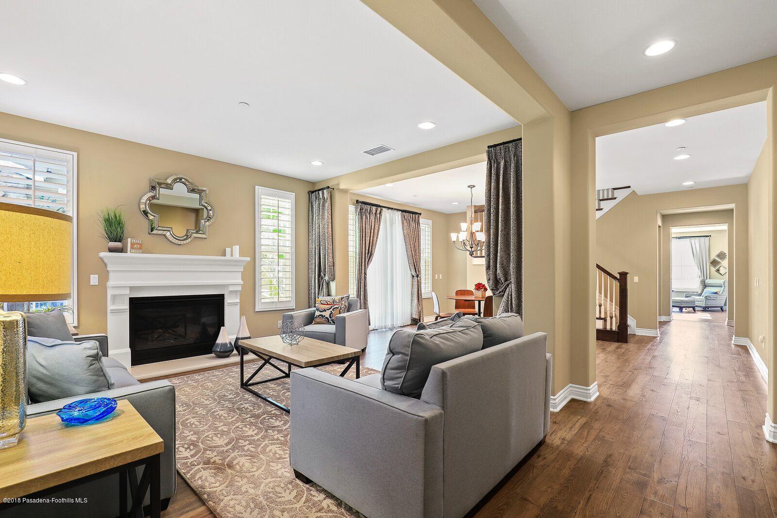3406 Avondale Road Pasadena, CA 91107 - Photo 5 of 22 a living room with furniture and a fireplace