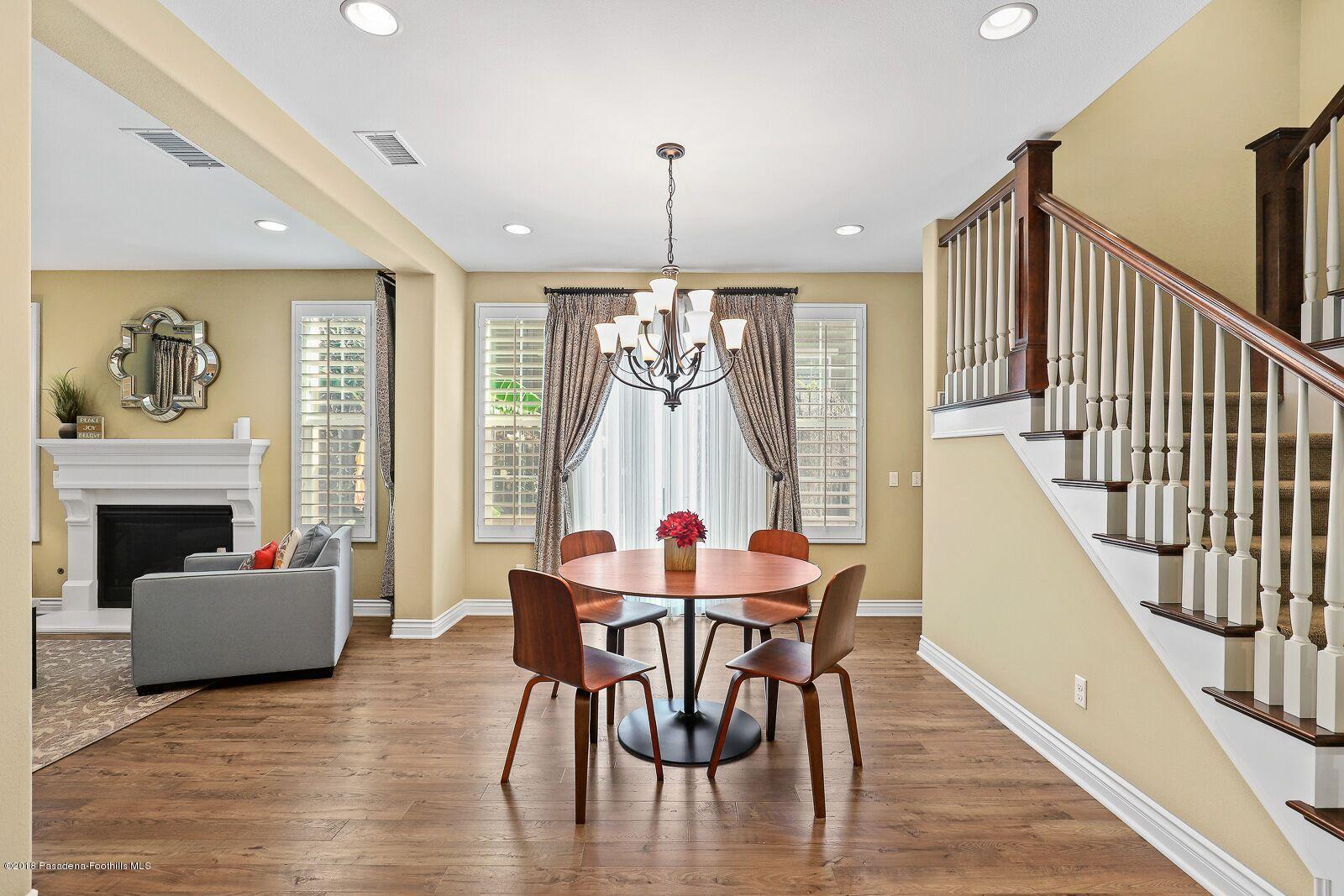 3406 Avondale Road Pasadena, CA 91107 - Photo 7 of 22 a dining room with furniture window and wooden floor