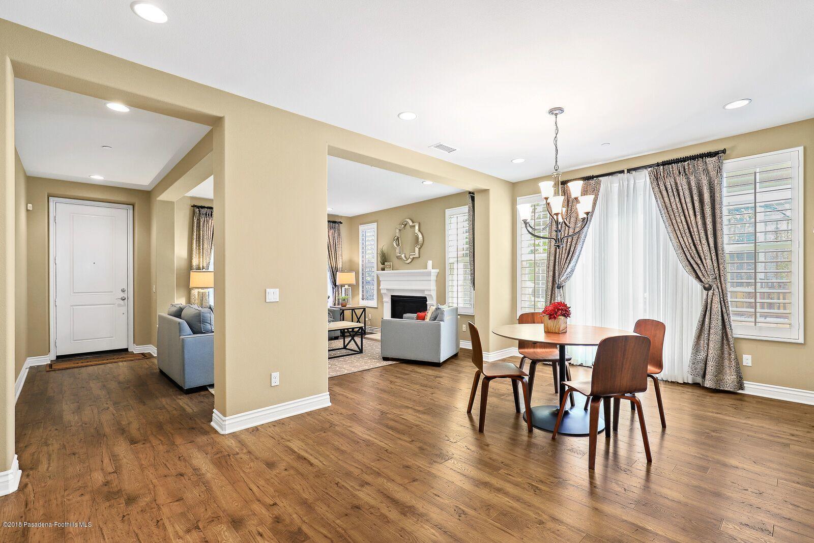 3406 Avondale Road Pasadena, CA 91107 - Photo 8 of 22 a view of a dining room with furniture and wooden floor