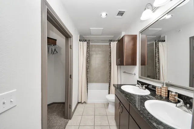 a view of a living room and dining room