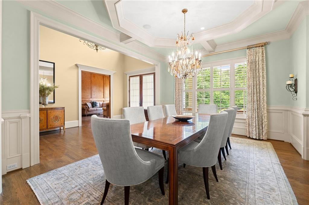 322 Edwards Brook Lane Canton, GA 30115 - Photo 15 of 99 a view of a dining room with furniture window and wooden floor