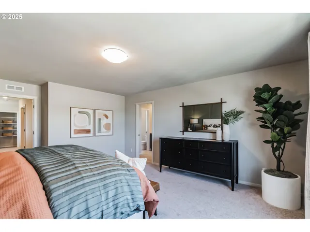 a bathroom with a sink vanity and mirror