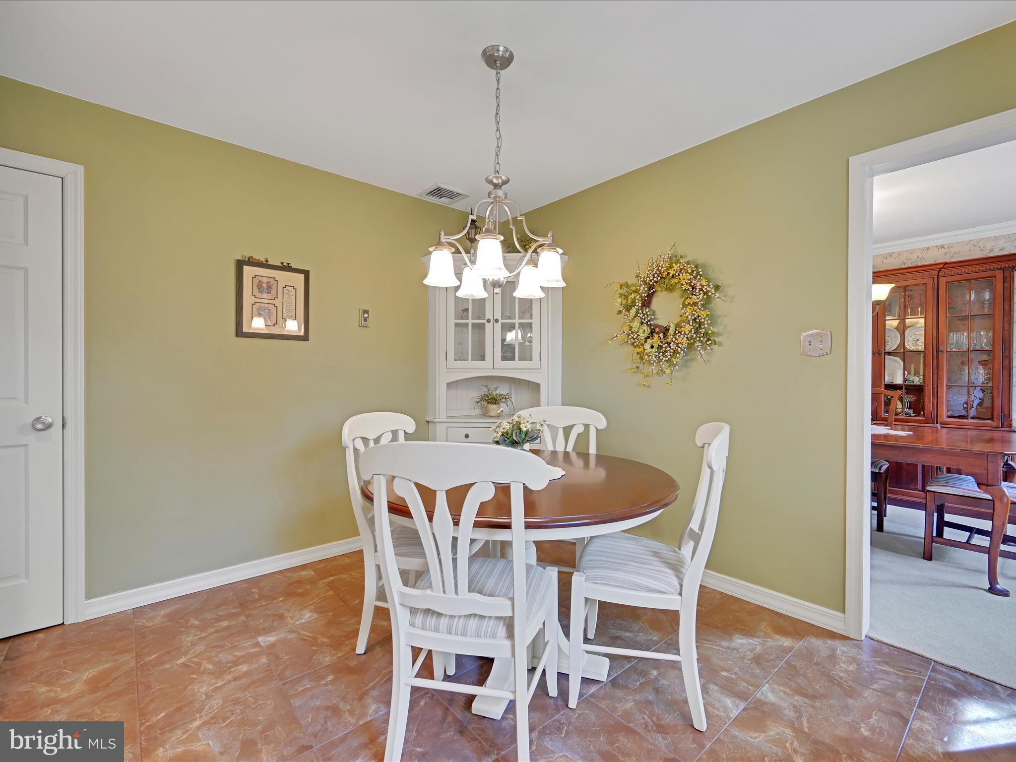 834 Blue Grass Road Lancaster, PA 17601 - Photo 8 of 36 a dining room with furniture and chandelier kitchen view