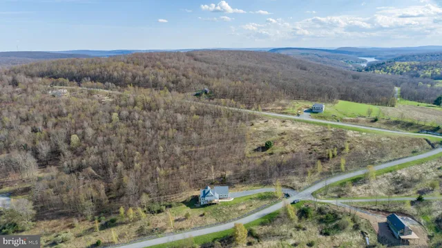 a kitchen with stainless steel appliances granite countertop a sink and refrigerator