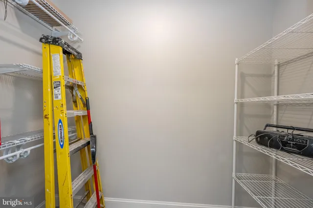 a view of house with a yard