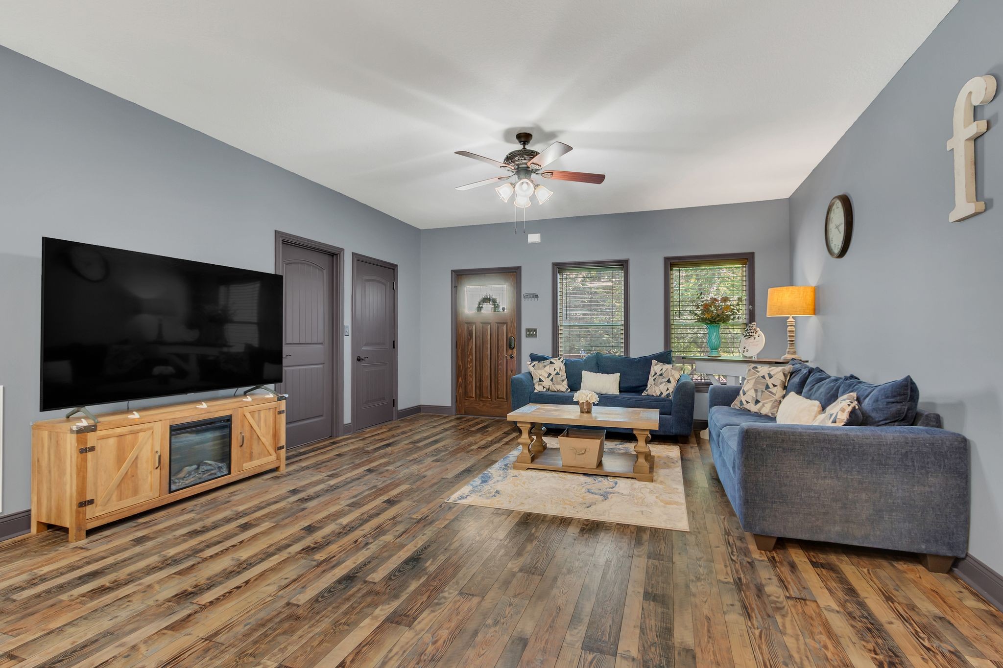 1027 Garton Road Burns, TN 37029 - Photo 11 of 36 a living room with furniture and a flat screen tv