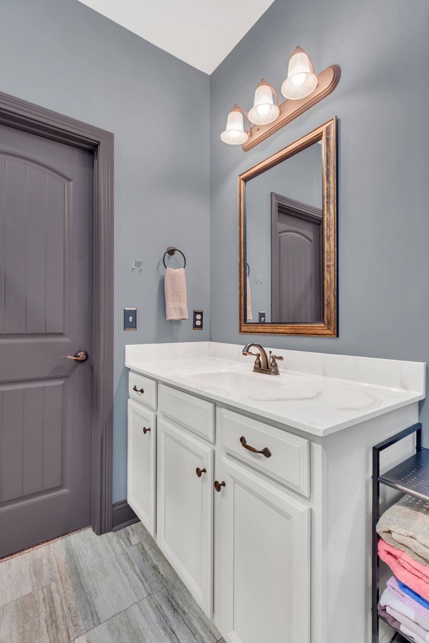 1027 Garton Road Burns, TN 37029 - Photo 20 of 36 a bathroom with a sink vanity and a mirror