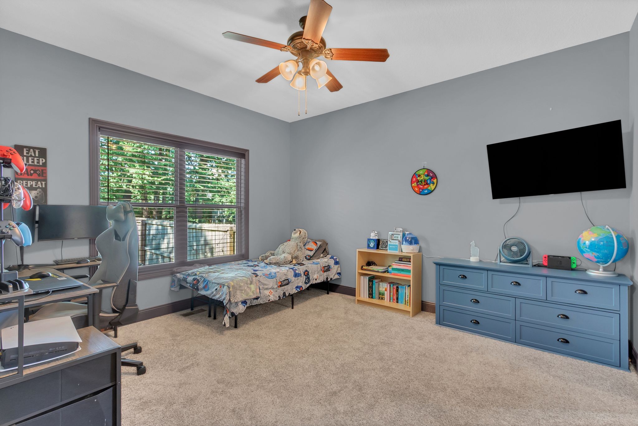 1027 Garton Road Burns, TN 37029 - Photo 23 of 36 a living room with furniture and a flat screen tv