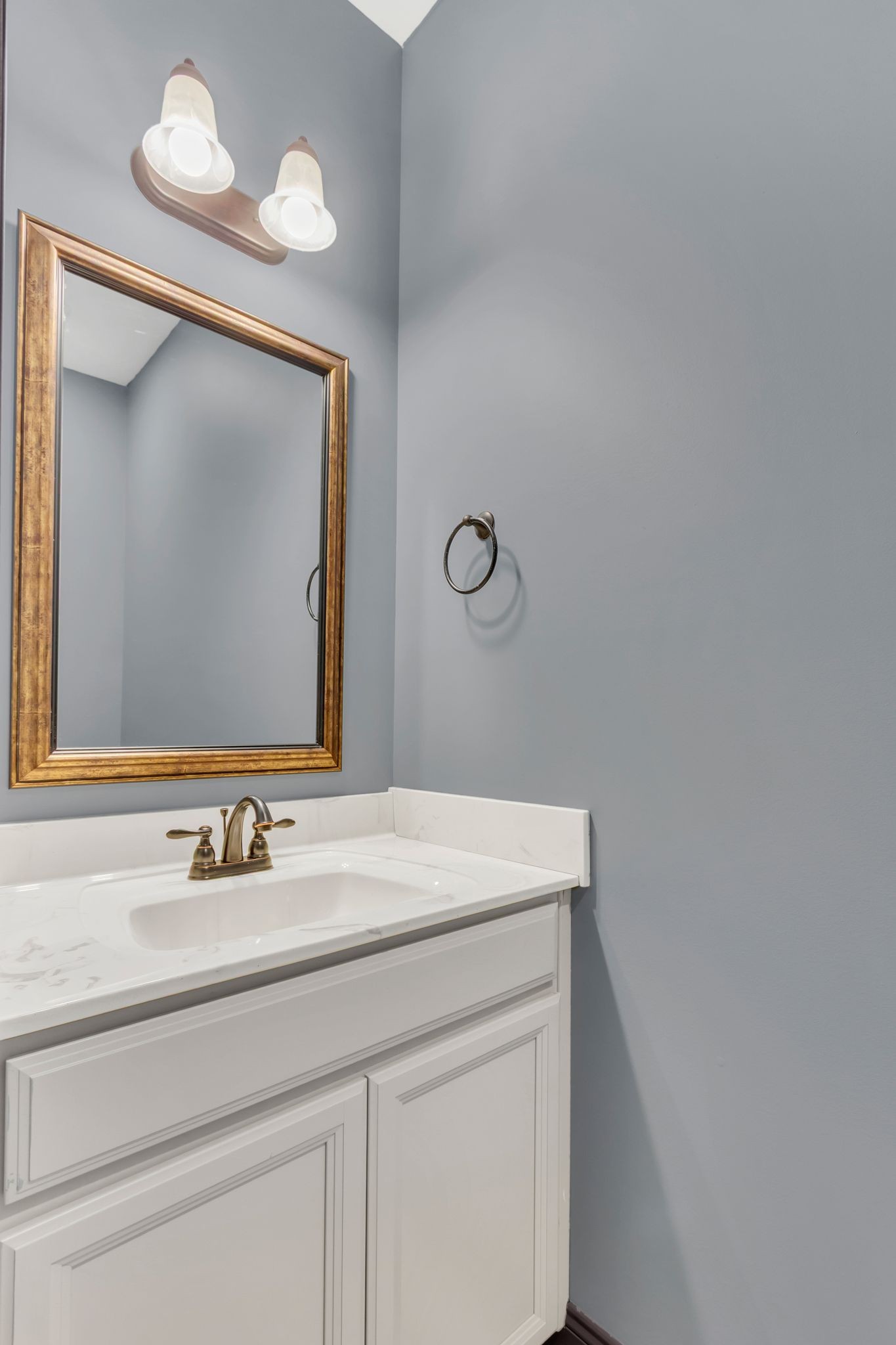 1027 Garton Road Burns, TN 37029 - Photo 30 of 36 a bathroom with a sink and a mirror