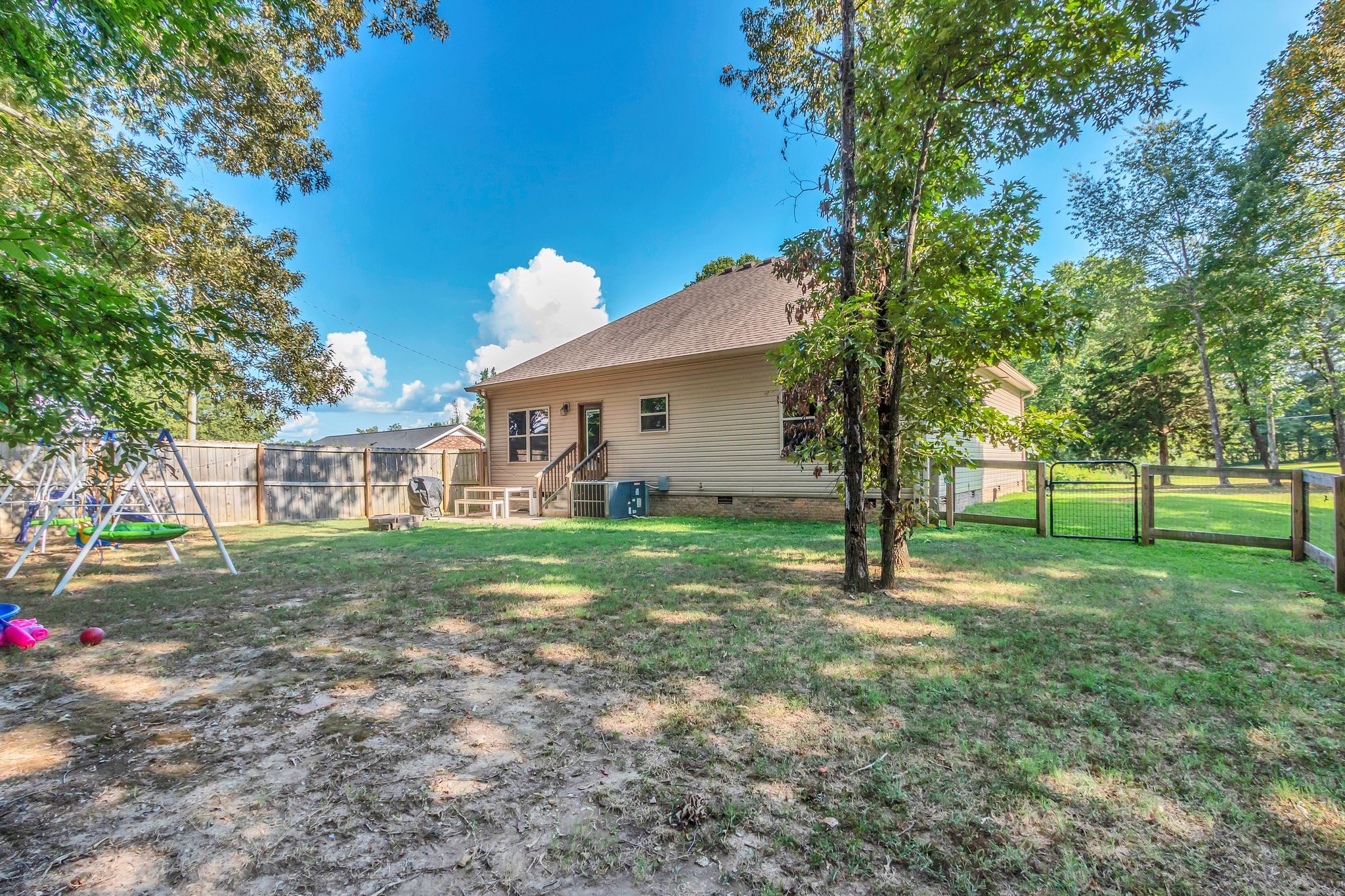 1027 Garton Road Burns, TN 37029 - Photo 33 of 36 a view of a house with a yard