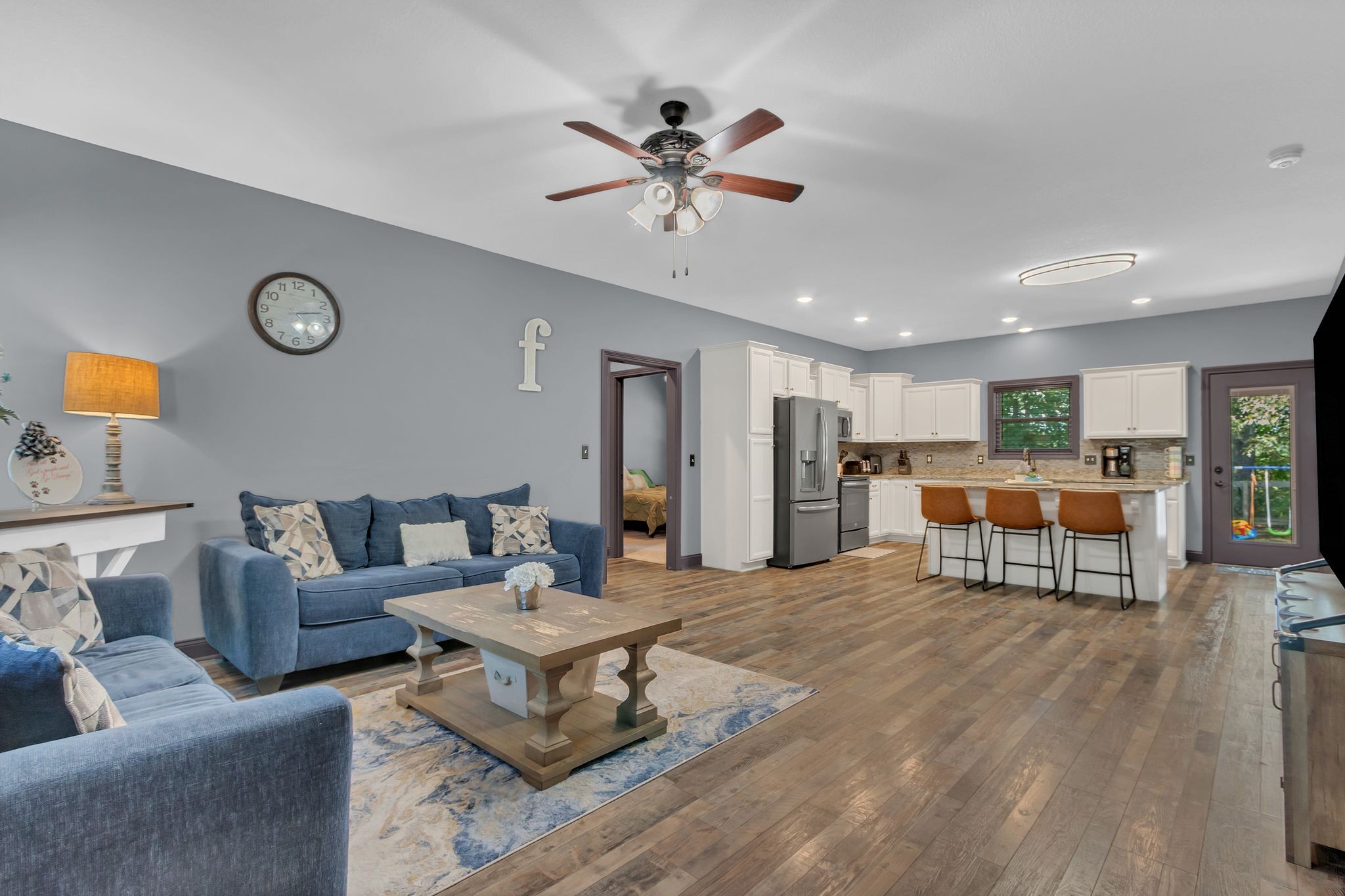 1027 Garton Road Burns, TN 37029 - Photo 8 of 36 a living room with furniture and kitchen view