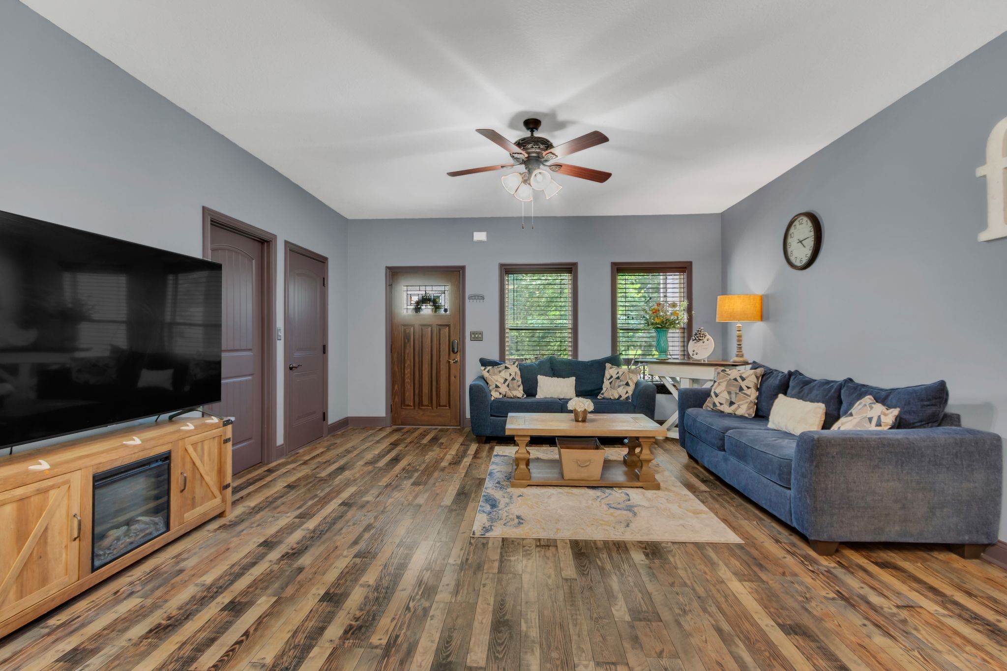 1027 Garton Road Burns, TN 37029 - Photo 10 of 36 a living room with furniture and a flat screen tv