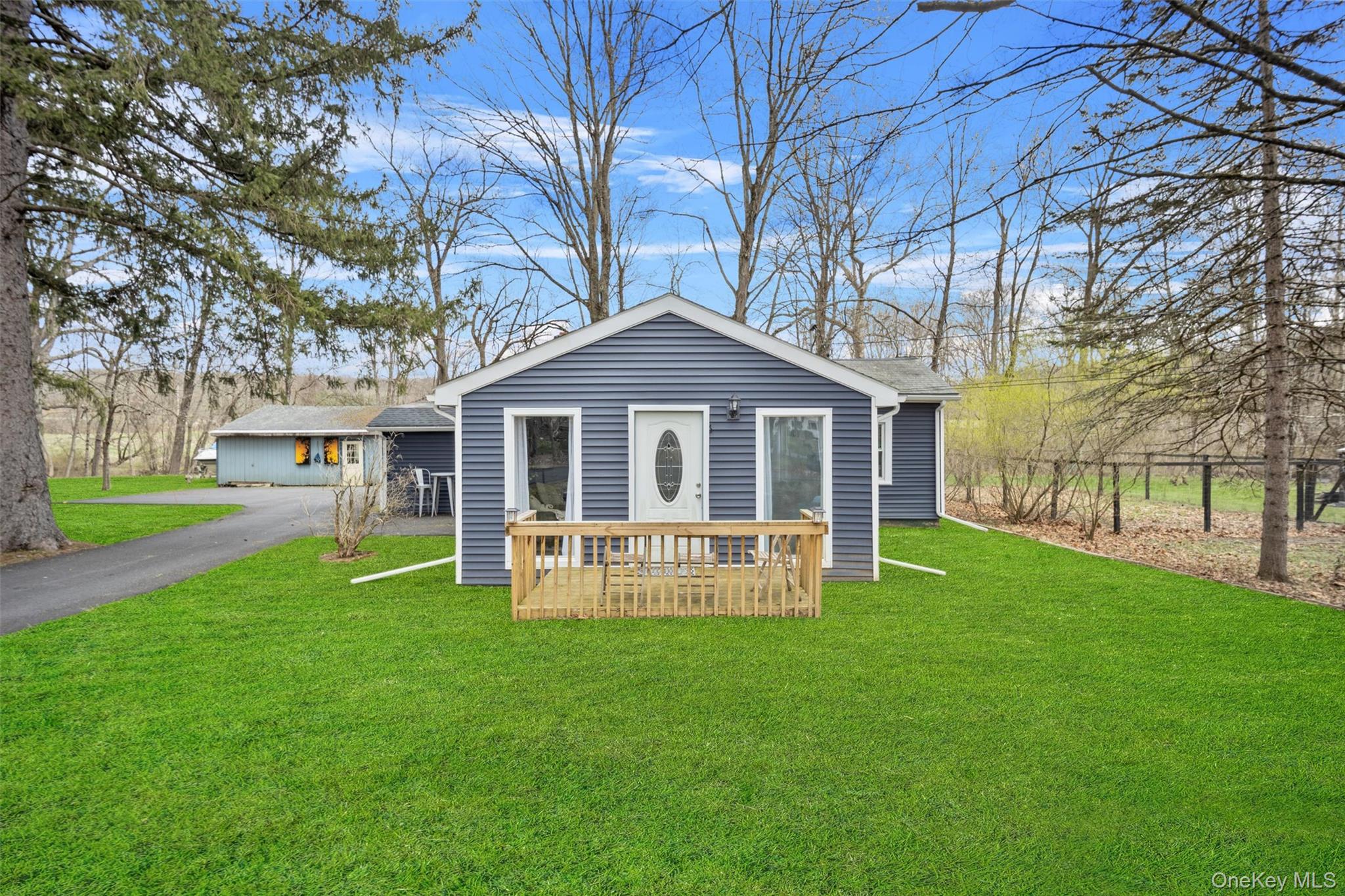 16 Titus Road Poughkeepsie, NY 12603 - Photo 1 of 1 a front view of house with yard and outdoor seating