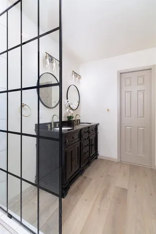 a living room with a black white checkered floor